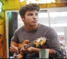 One of his hidden talents is that he can also play the guitar.